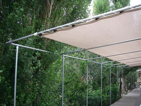 how to hang fabric shade on a metal porch|how to use shade fabric.